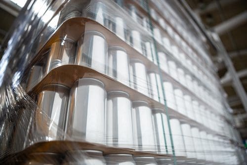 Pallet of cans photo for website redesign email