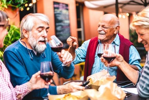 Owners enjoying wine for merchandise post
